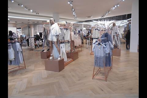 The flooring changes as the shopper heads towards the back of the 11,500 sq ft womenswear department, fostering the idea of different shop-in-shops.